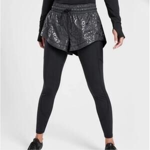 Athleta Rainer 2 in 1 tights black leopard shorts - M